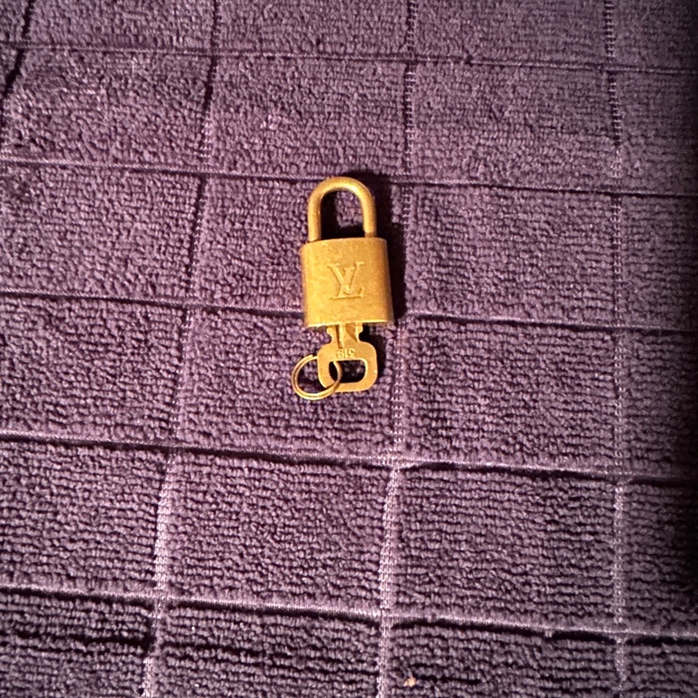Authentic Louis Vuitton Lock with Key # 319